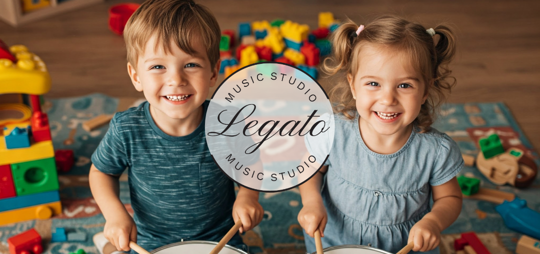 Kids playing instruments while smiling with the Legato Music Studio logo